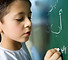 Boy Writing on a Blackboard