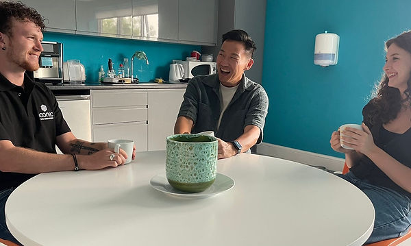 Iconic Project Management team members having coffee