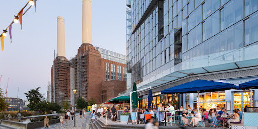 Phase 1 of the Battersea Power Station redevelopment, Circus West Village, completed in 2017. The restoration of the main power station building is due to complete in September 2022.