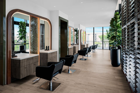 Miami Beach hair salon interior fully adjustable sinks and advanced haircare equipment.