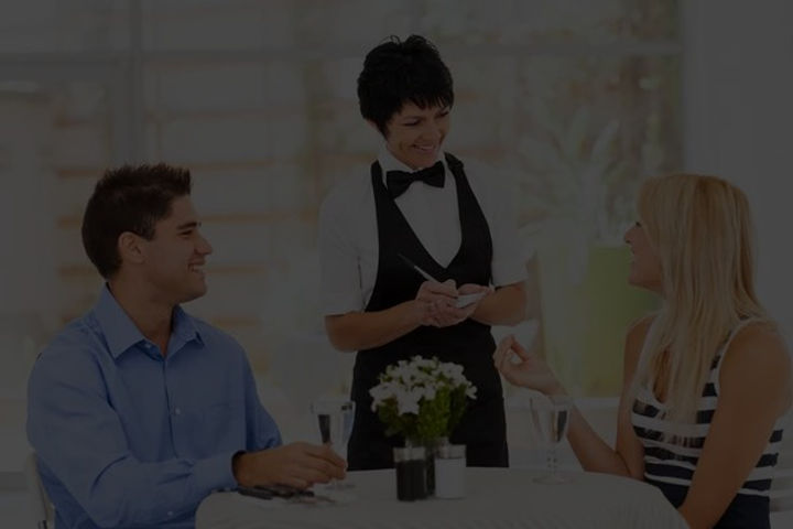 depositphotos_19082347-stock-photo-friendly-middle-aged-waitress-taking_edited.jpg