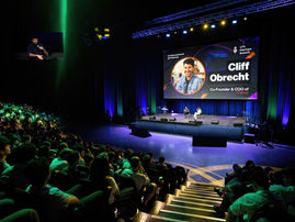 Corporate Videography and photography of Cliff Obrecht, founder of Canva, speaking at the UTS Startups Summit at the ICC Sydney