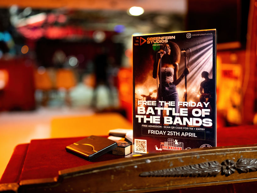 Videography and photography of a Battle of the Bands Poster