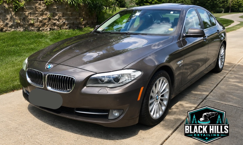 a brown bmw with a ceramic coating after mobile detailing service