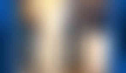 Tom speaking to friends