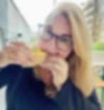 Author Nicole Gustin eating a taco