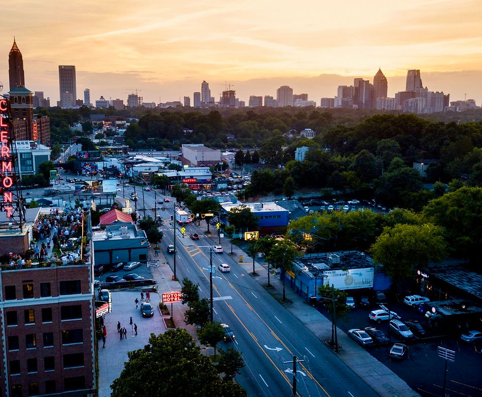 The famous Hotel Clermont, with a packed rooftop bar and an Atlanta skyline view at sunset