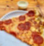 Slice of pepperoni with ranch dipping sauce from Glide Pizza