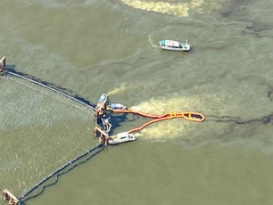 Pollution response teams mitigate oil discharge
