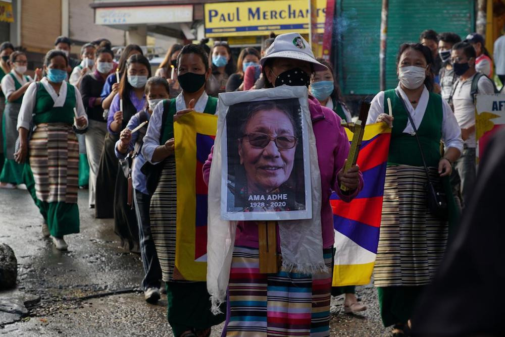 SFT and TWA activists hold a vigil in memory of Ama Adhe at McLoed Ganj on August 3, 2020 (Photo by Tenzin Leckphel)