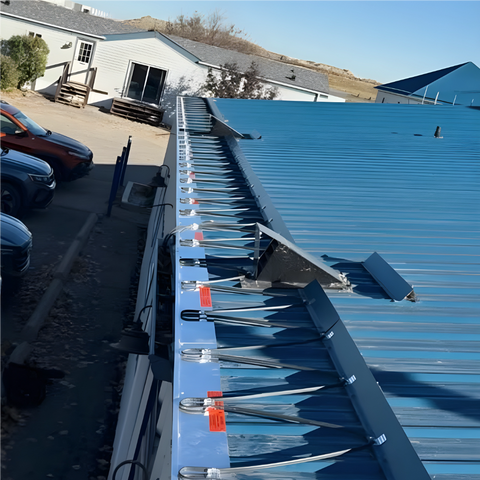 Commercial grade heat trace cable installed in a metal gutter system for a Calgary business.