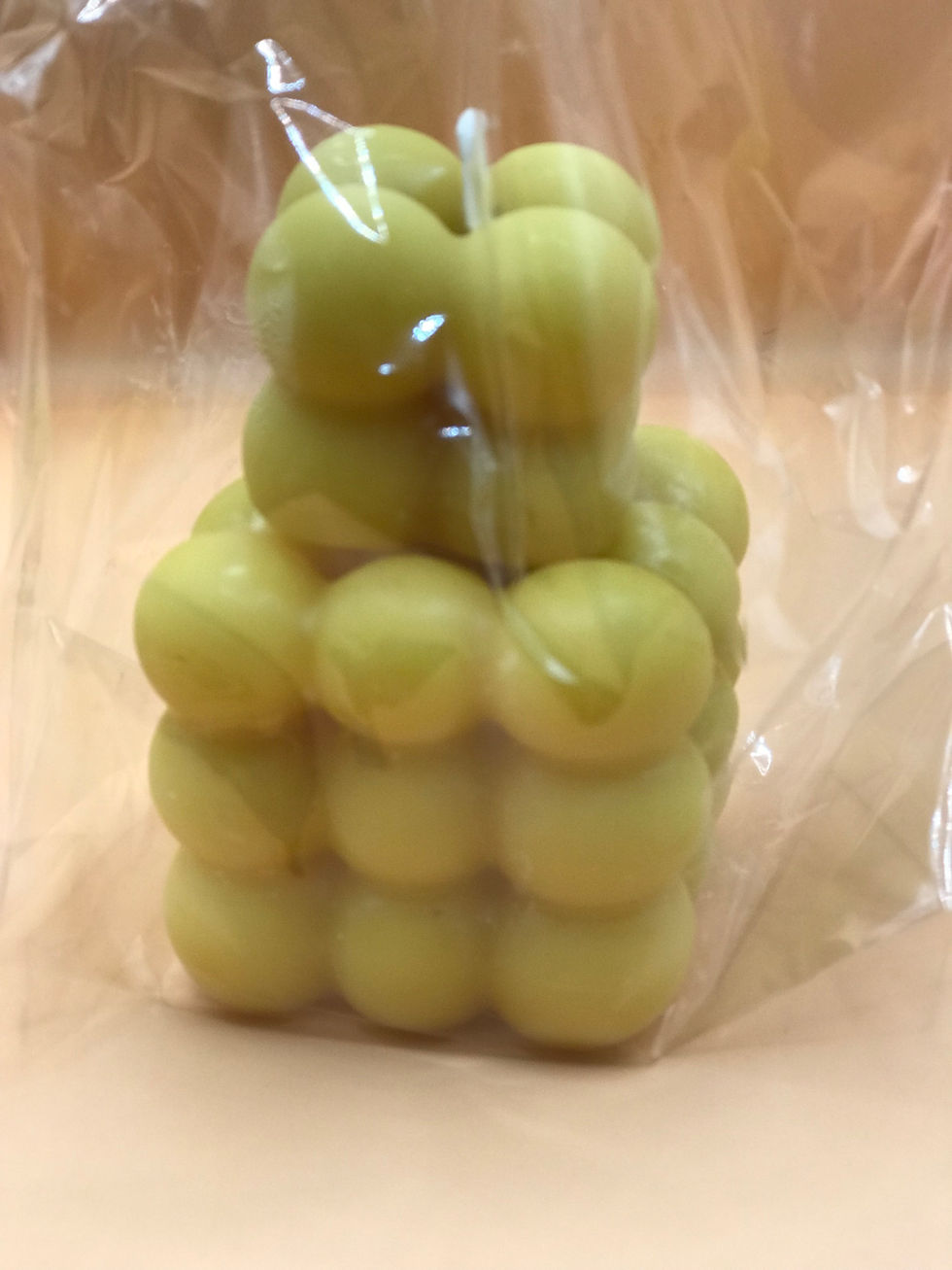 Thumbnail: Yellow bubble candle in cellophane