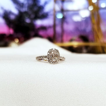 Oval Diamond with Halo Engagement Ring