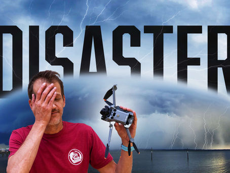 Man facepalms holding a broken drone under a stormy lightning sky with huge DISASTER text over water.