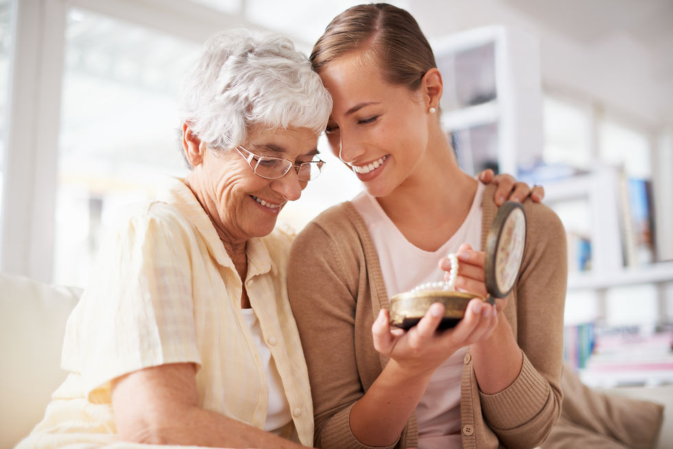 Grandmother giving her grand daughter pearls
