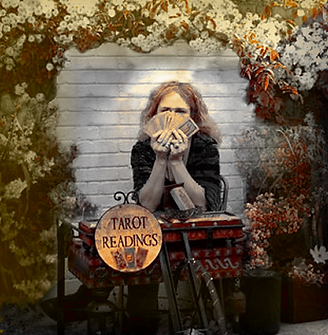 Tarot by Seven holding tarot cards