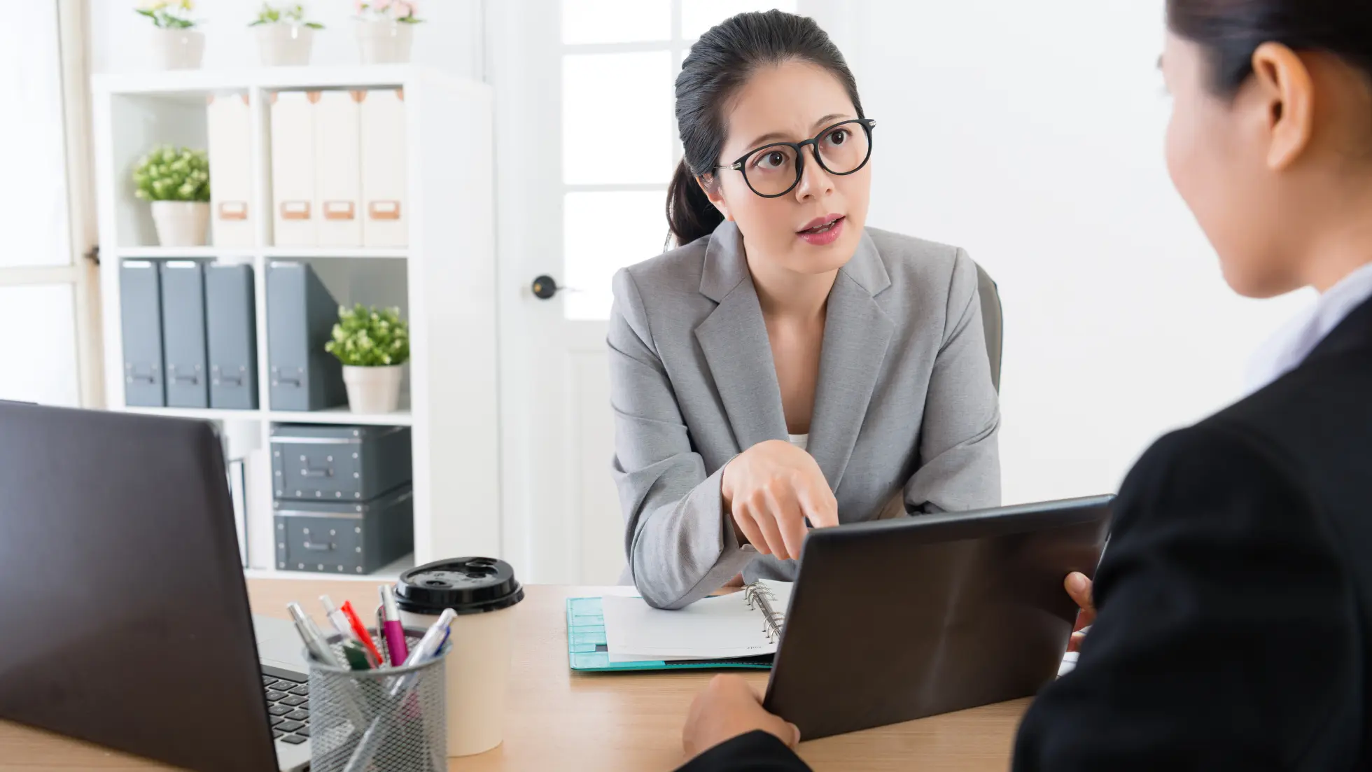 A boss explaining duties to an employee