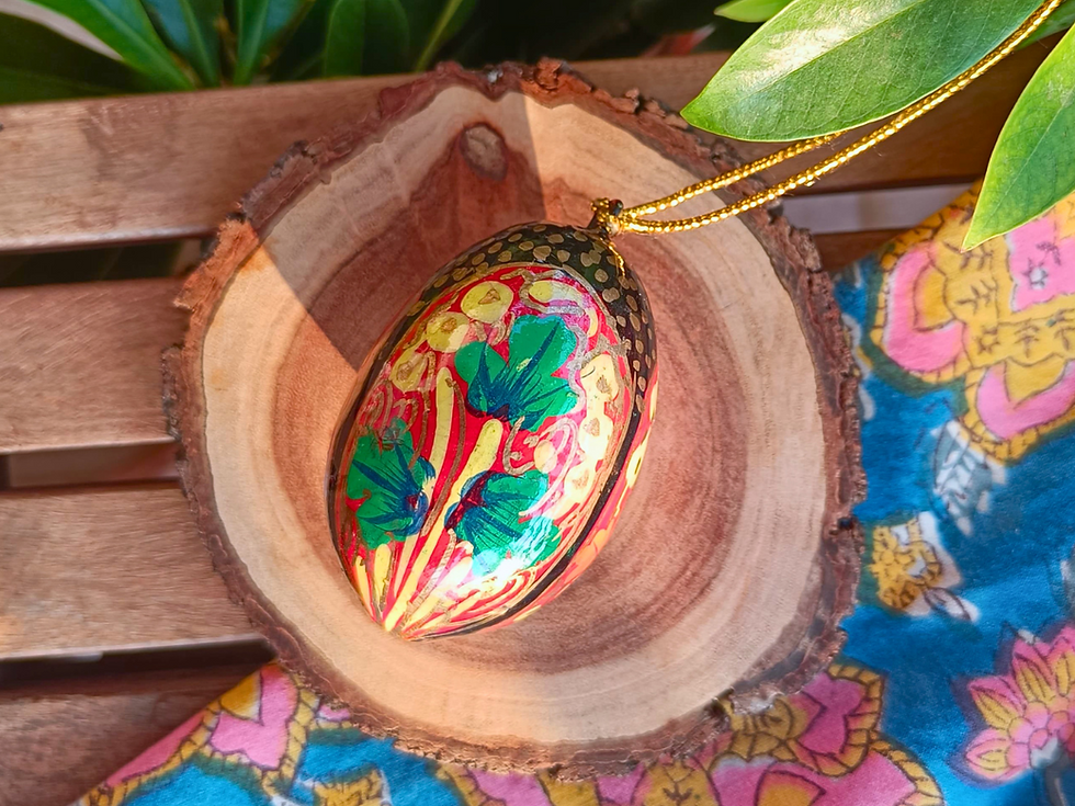 Thumbnail: Hand painted walnut wood hanging ornament in red with floral detailing, festive Indian decor piece for gifting and home accen