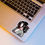 Thumbnail: Anime sticker featuring Sasuke Uchiha with his Sharingan on a laptop.