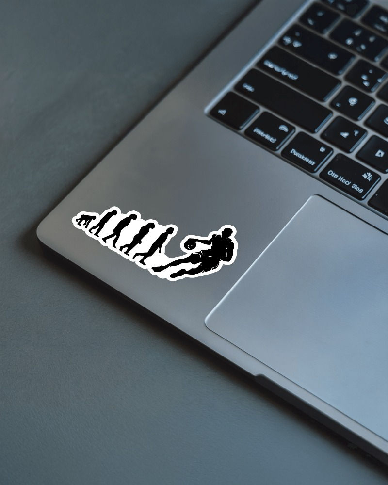 Sticker of evolution of man to basketball player.