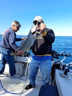 Al Pratt with his first lake trout on the day.jpg