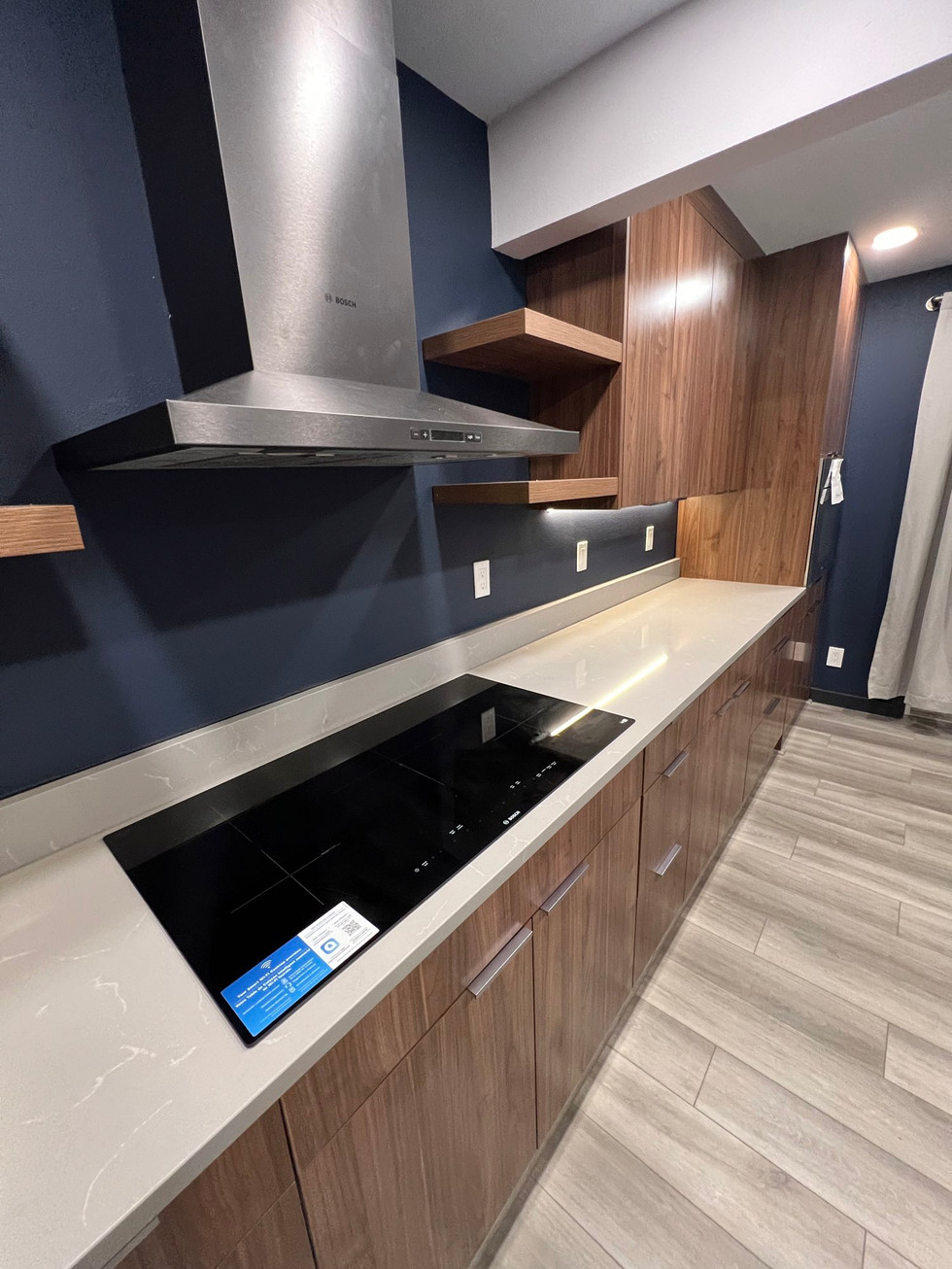 a kitchen with a bosch stove top oven