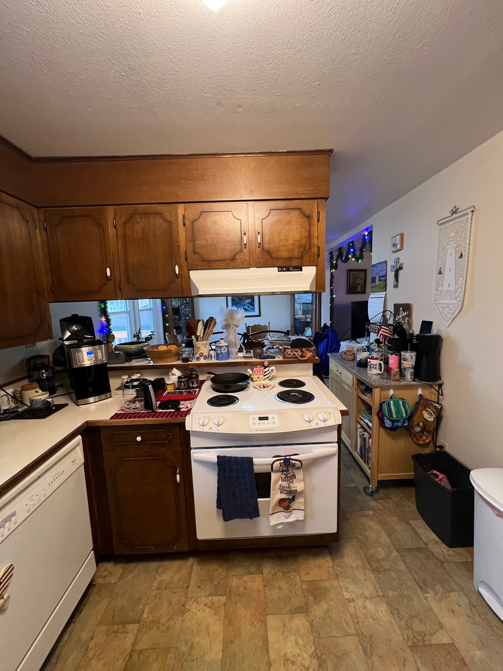 a kitchen with a stove top oven