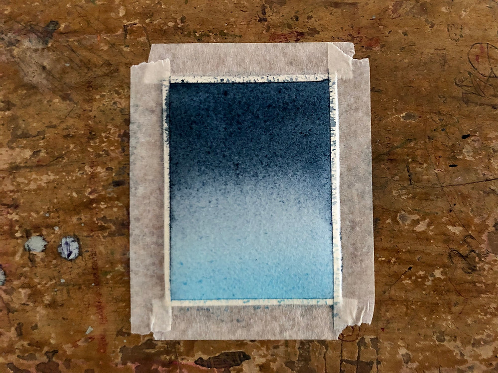 First wash of watercolor landscape painting