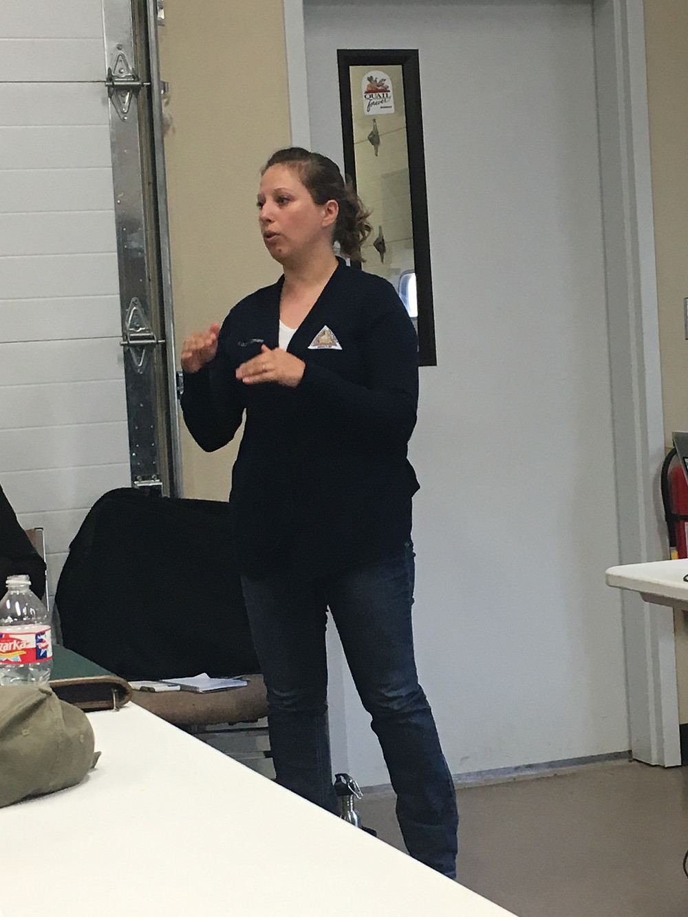 Missouri Department of Conservation Furbearer Biologist, Laura Conlee giving presentation about reporting sightings of badger, spotted skunks, and weasels. She also touched on a few regulation proposals.