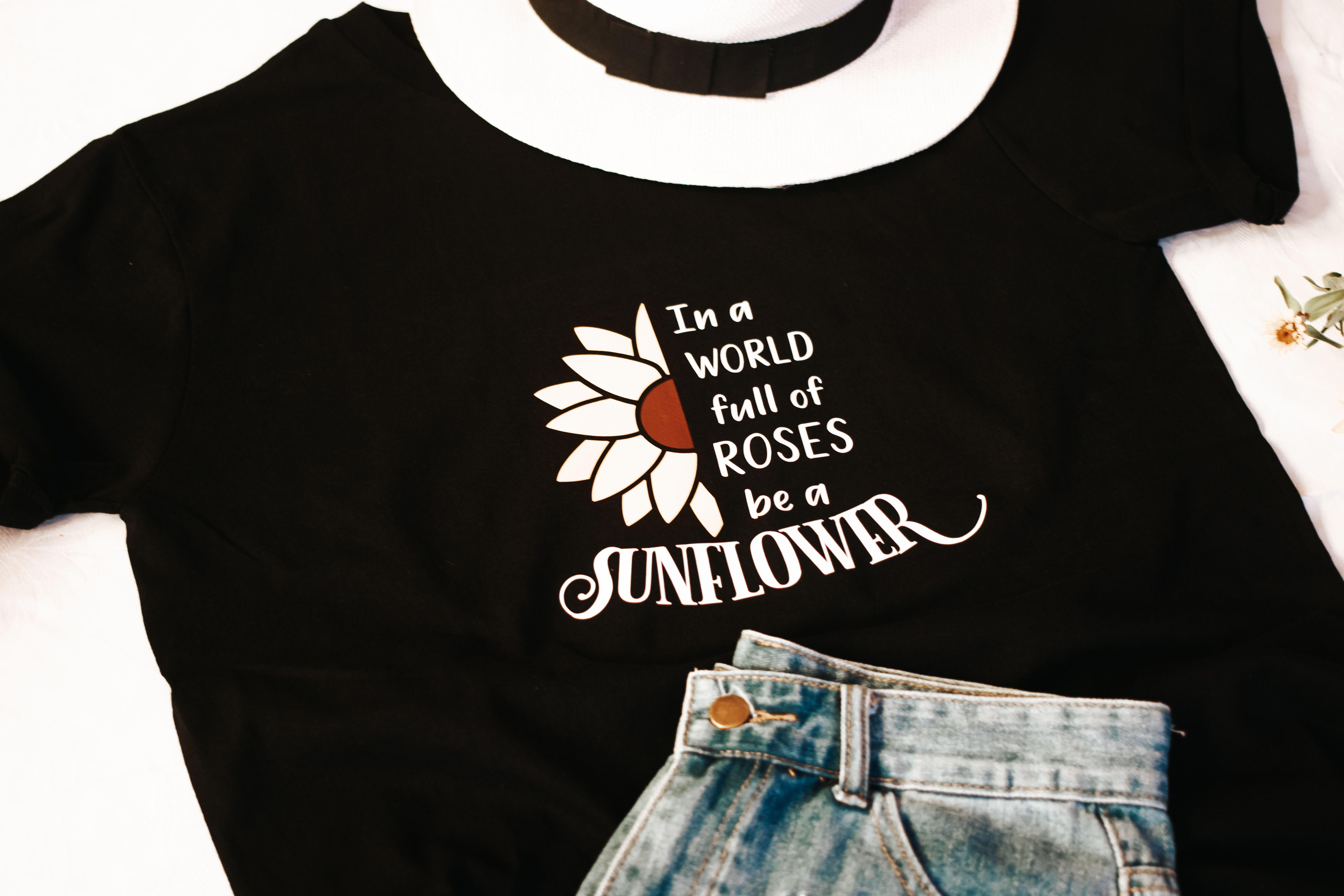 In A World Full Of Roses Be A Sunflower Tee