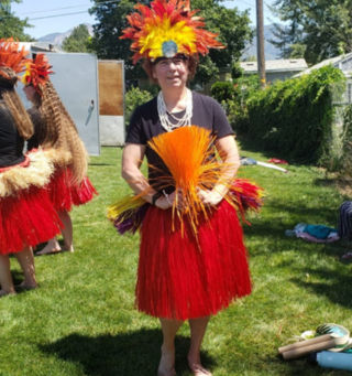 Kathy dancing Tahitian dance