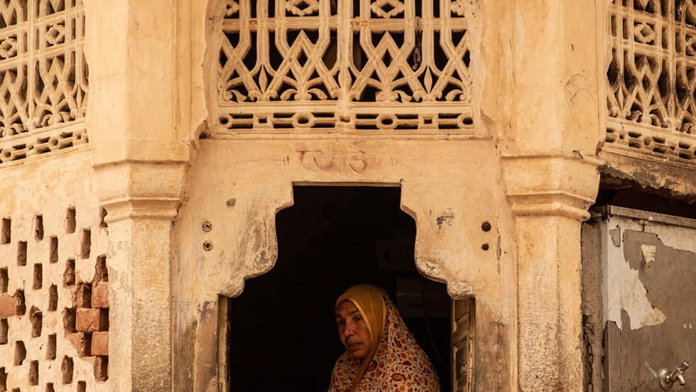 Lady selling holy water.jpg