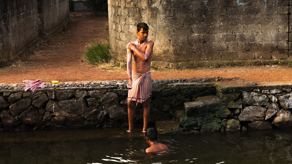 Early morning wash in the backwaters.jpg