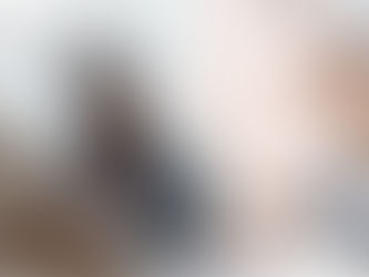 Two healthcare workers in conversation, focusing on collaboration and patient care.