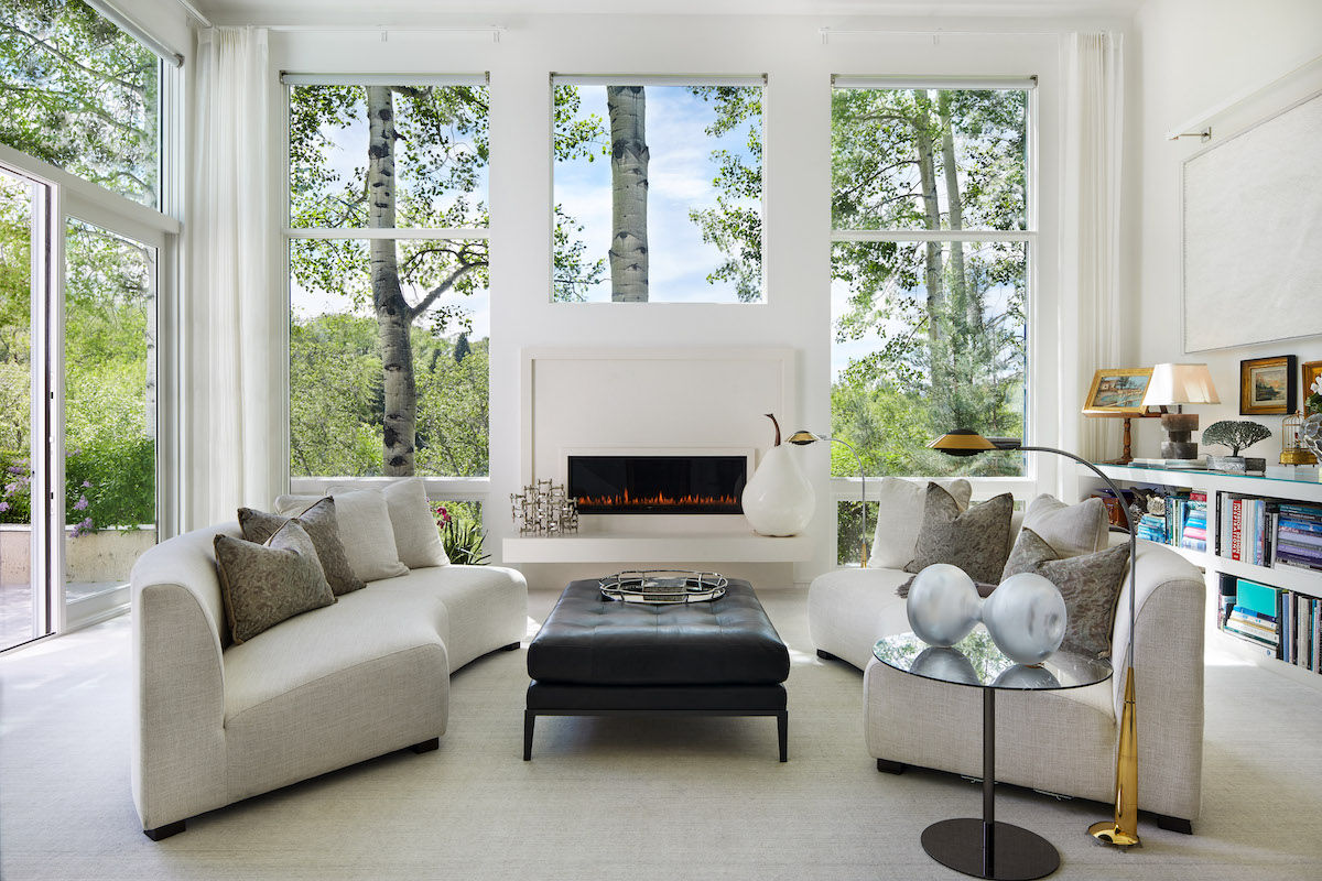 Beautiful white interior design with fireplace