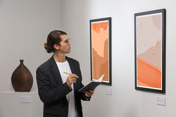 young-man-going-art-gallery