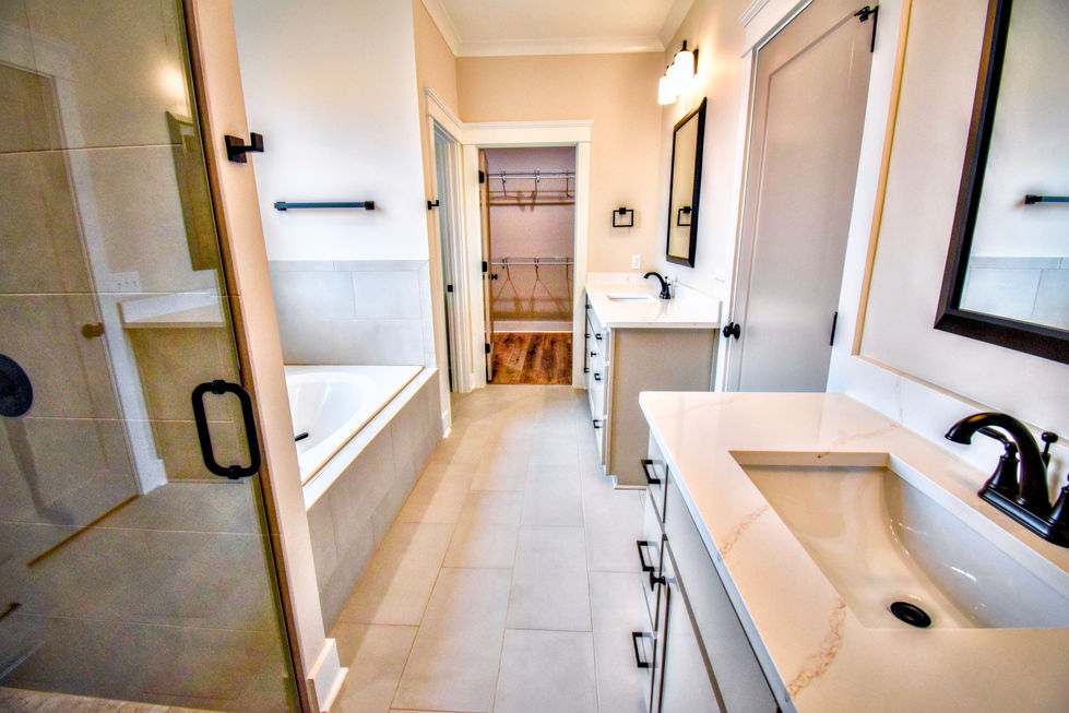 MASTER BATH LEADING TO MASTER CLOSET