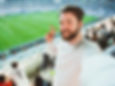 Football fan creating genuine UGC at a sports game