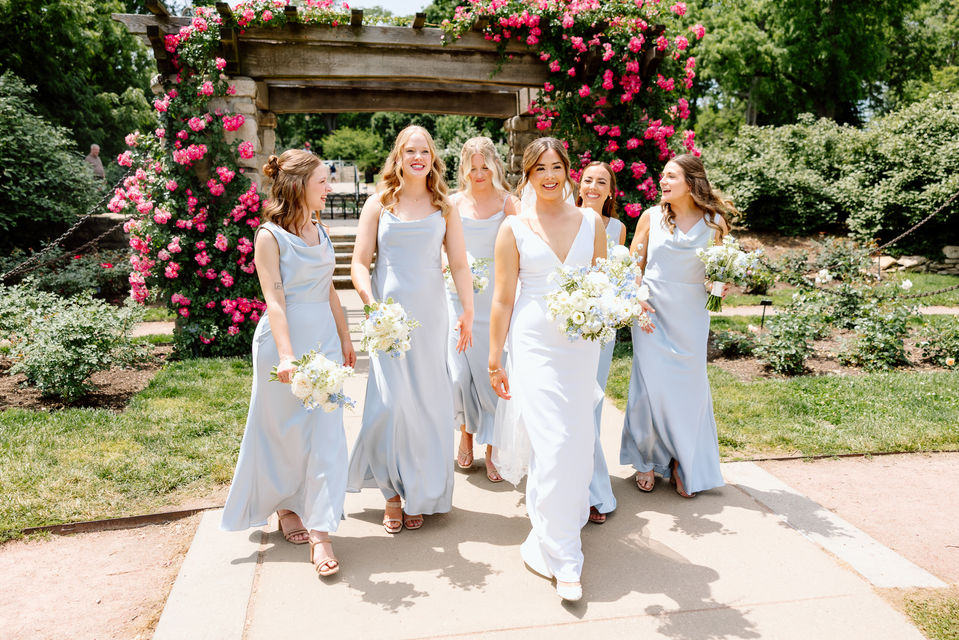 Bride and Bridesmaids at Loose Park with White Florals and baby blue dresses