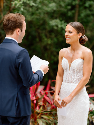 Bride reading private vows during intimate first look at Playa del Carmen destination wedding