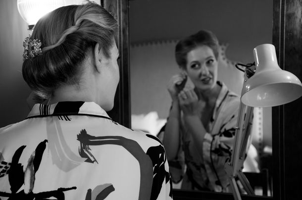 noir bride in mirror