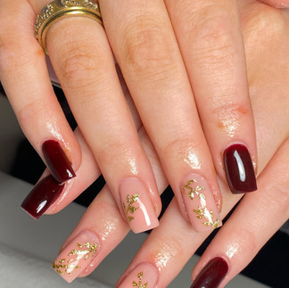 brown and ambre biab nails with gold glitter nail art 