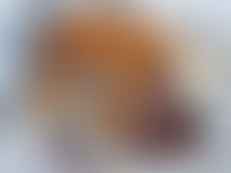 Churros på en plåt med chokladsås, hasselnötter och kokosöverdrag