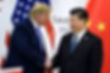 In this file photo taken on June 28, 2019, China's President Xi Jinping (R) shakes hands with US President Donald Trump before a bilateral meeting on the sidelines of the G20 Summit in Osaka. - From the Arab Spring to bloodletting in Syria, from Obama to Trump, from terror in the streets of Paris to Brexit, the 2010s began with hope for a more equitable world, and end with a slide towards nationalistic populism. (Photo by Brendan Smialowski / AFP) (Photo by BRENDAN SMIALOWSKI/AFP via Getty Images)