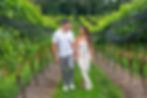 Couple walking the vineyard