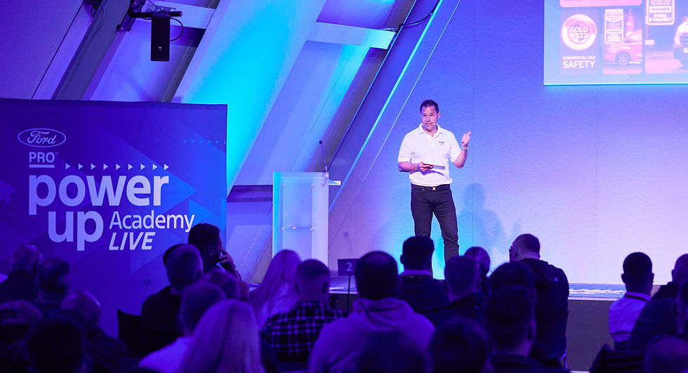Presenter Kevin Harris on stager delivering an automotive training session for Ford UK commercial vehicle dealers.