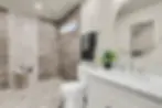 Bathroom with stone tile