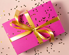 pink gift box with yellow ribbon_edited