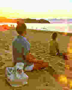 sunset sayulita meditating friends on the beach