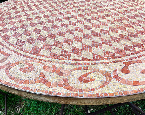 Geometric mosaic table made with antique terracotta